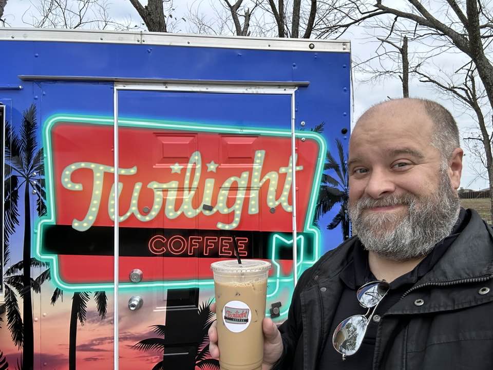 Bo enjoying a cup of coffee